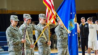 ROTC students stand at attention